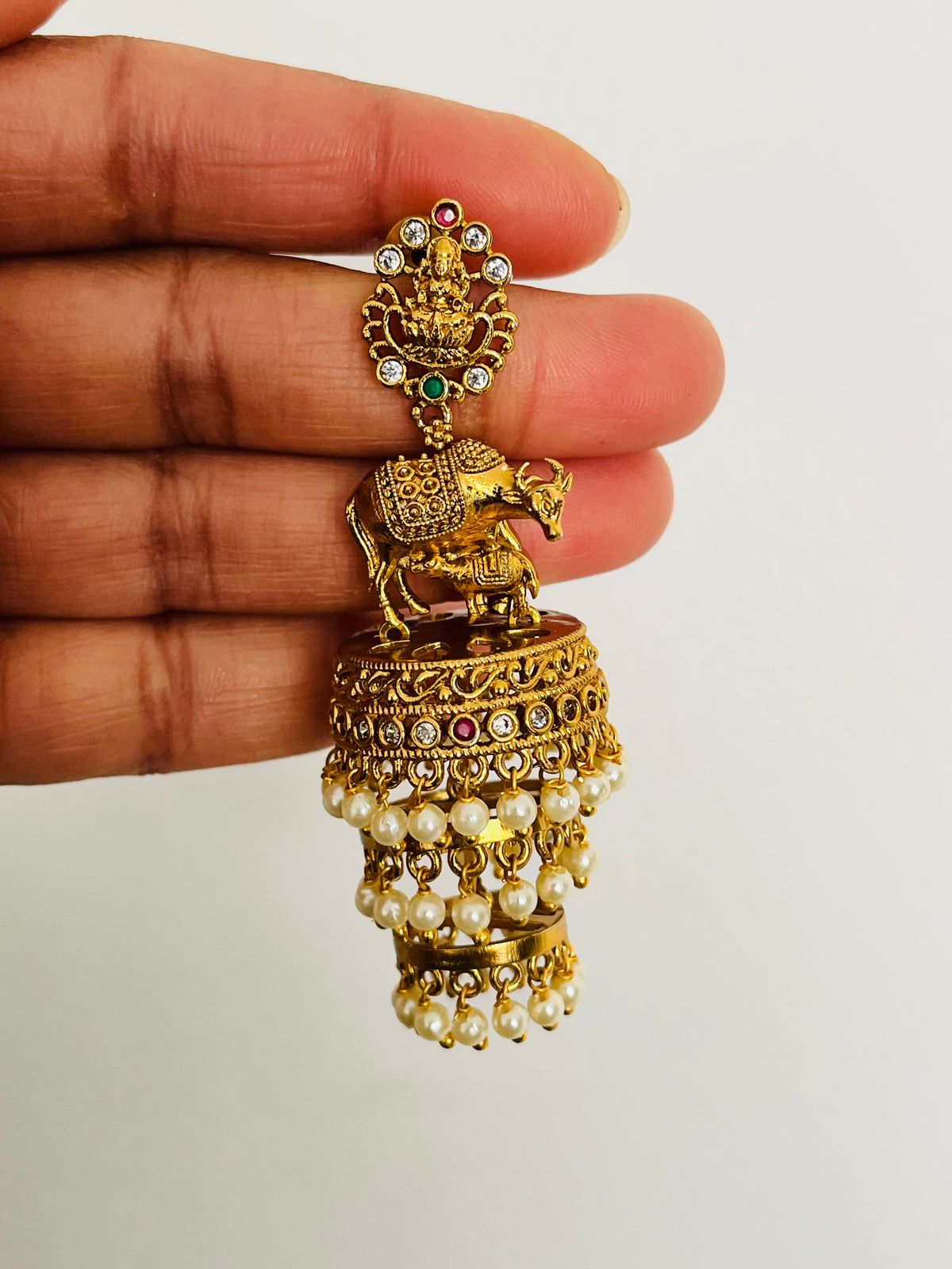 Nandini - Antique Gold Cow Motif Temple Jhumka Earrings with Pearl Drops
