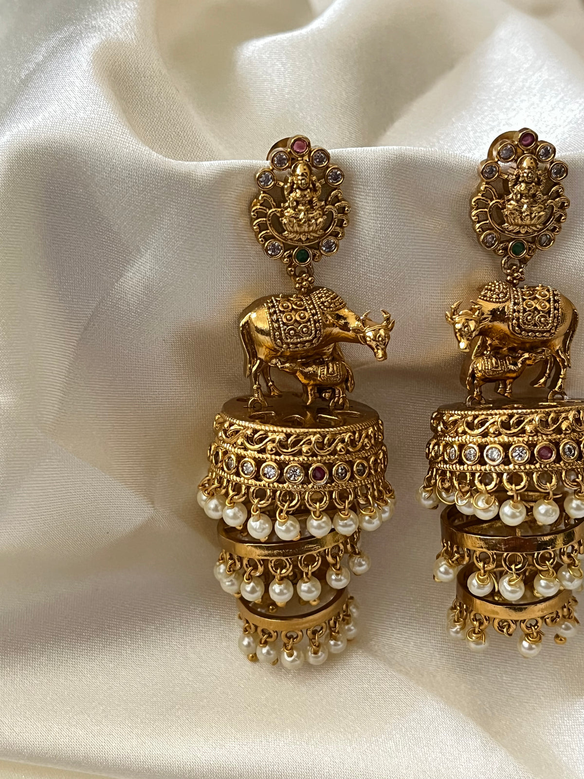 Nandini - Antique Gold Cow Motif Temple Jhumka Earrings with Pearl Drops