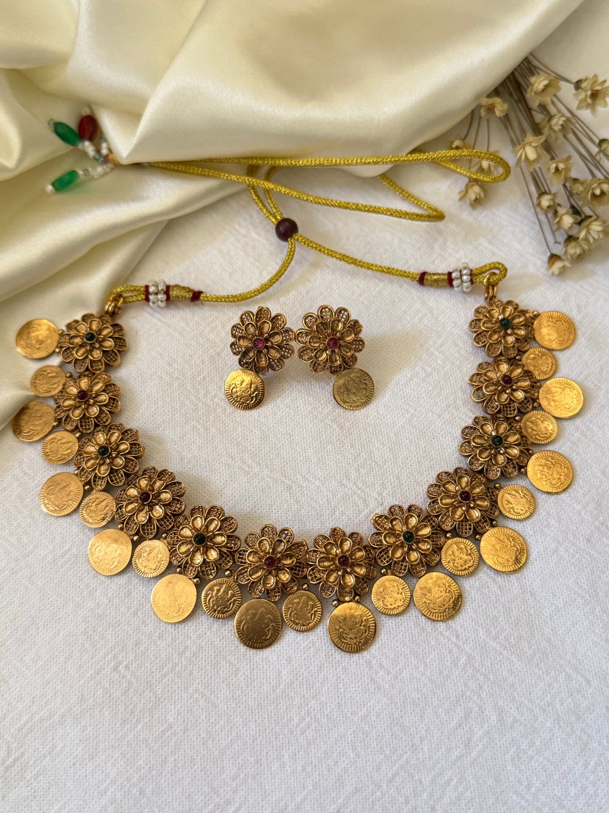 Varnika Antique Gold Floral Coin Necklace Set with Earrings