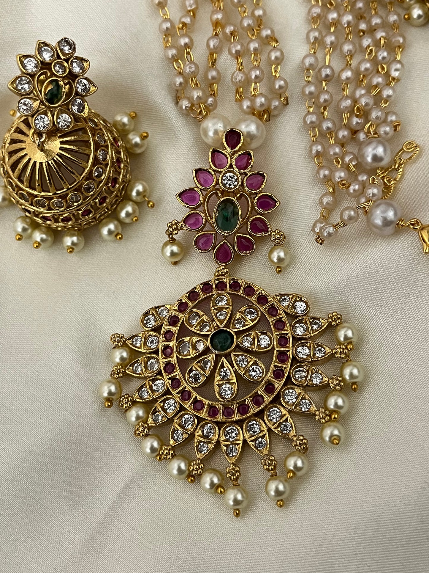 Prakruti - Two-Step Pendant Short Haaram Set | Multi-Strand Pearl style Necklace & Temple Jhumkas | Kundan & Kemp Work