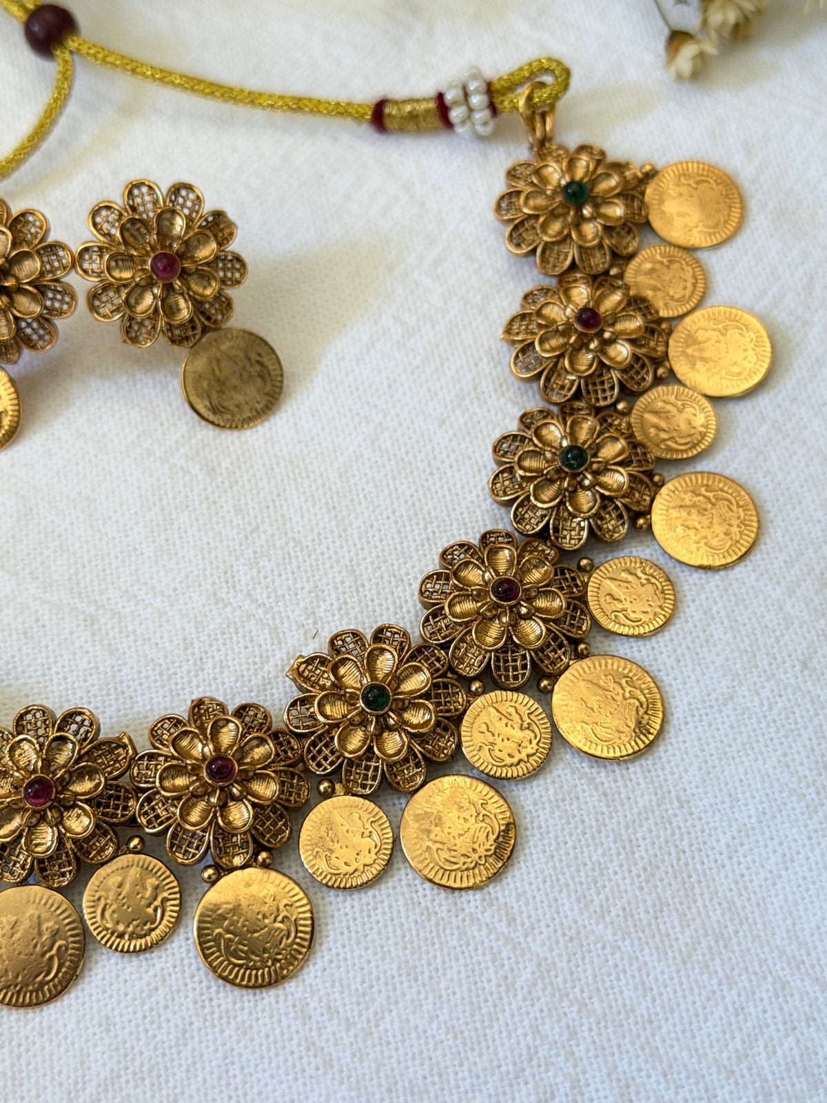 Varnika Antique Gold Floral Coin Necklace Set with Earrings