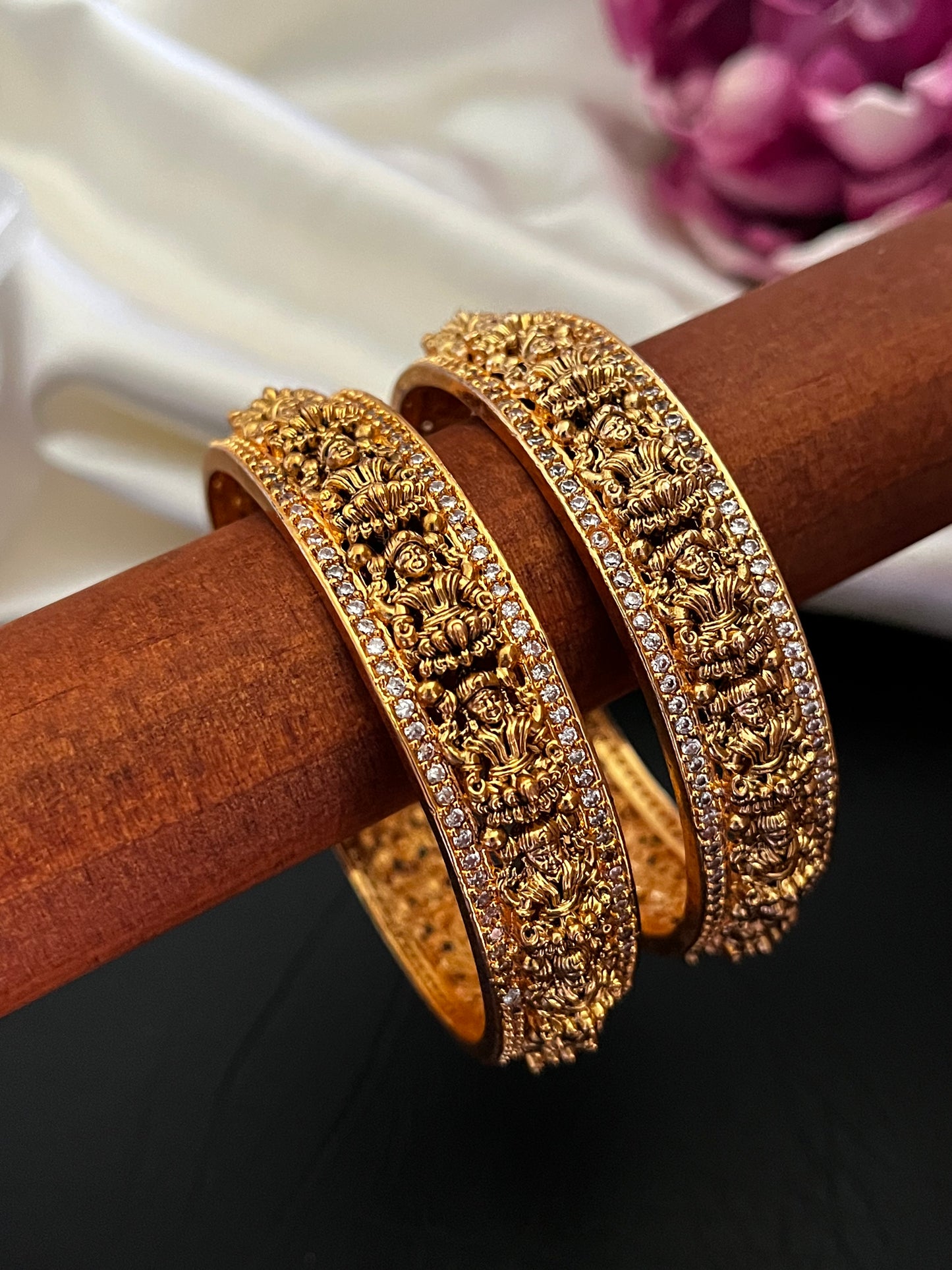 Shrinika – Lakshmi Motif Gold-Tone Bangles with Cubic Zirconia (Pair)