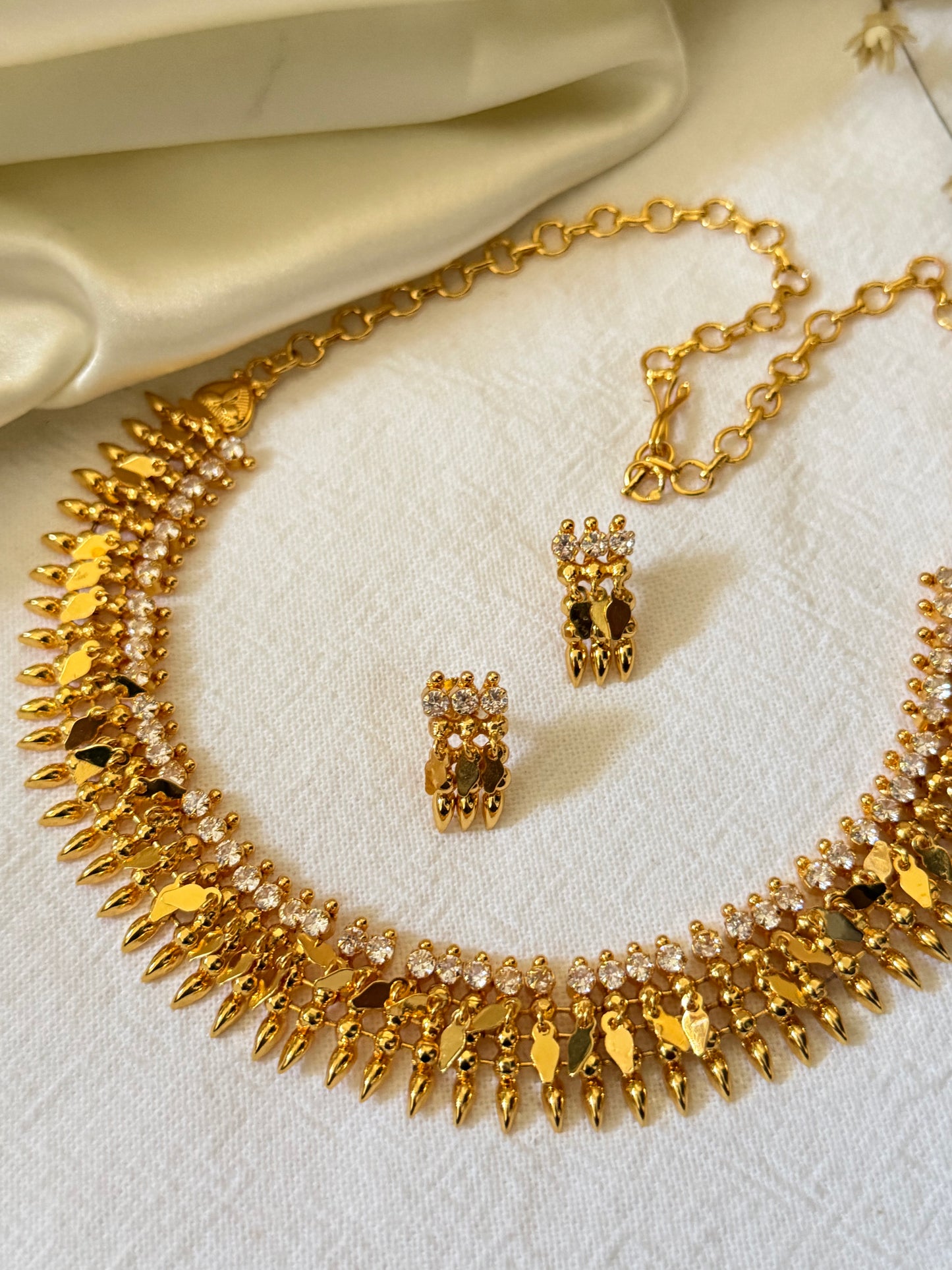 Tharika - Gold Plated CZ Kerala ilakkathali Set with Stud Earrings